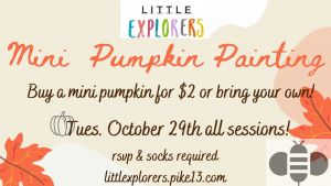 pumpkin painting at little explorers.jpg